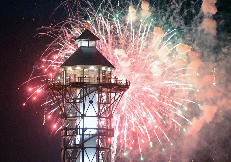 Independence Day fireworks burst behind Erie's Bicentennial Tower in this file photo from July 4, 2013.