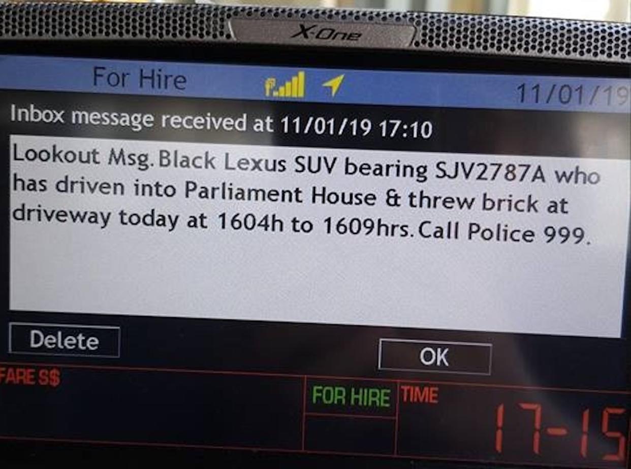 An alert was sent to taxi drivers to keep a lookout for a vehicle after the brick-throwing incident outside Parliament House. PHOTO: Facebook