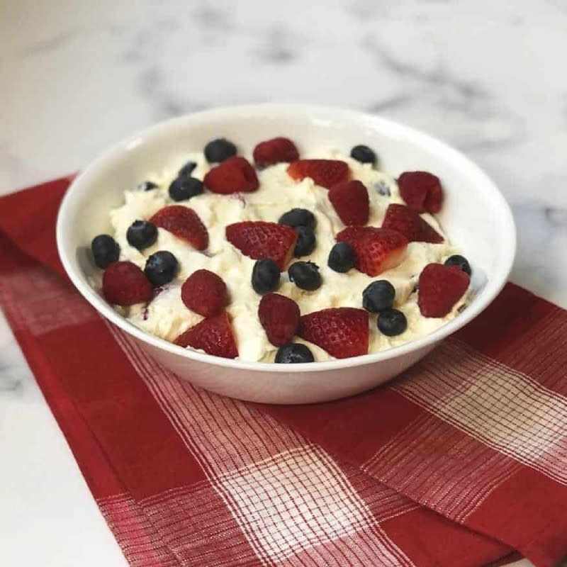 <p>Two Pink Peonies</p><p>This no-bake triple berry cheesecake fruit salad is not only a breeze to make but so yummy!</p><p><strong>Get the recipe: </strong><a href="https://www.twopinkpeonies.com/triple-berry-cheesecake-fruit-salad/" rel="nofollow noopener" target="_blank" data-ylk="slk:Triple Berry Cheesecake Fruit Salad;elm:context_link;itc:0;sec:content-canvas" class="link "><strong>Triple Berry Cheesecake Fruit Salad</strong></a></p>