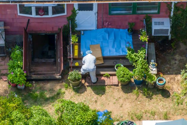 Investigator works in backyard of Long Island home of Gilgo Beach killings prime suspect Rex Heuermann - Credit: J. Conrad Williams Jr./Newsday RM via Getty Images