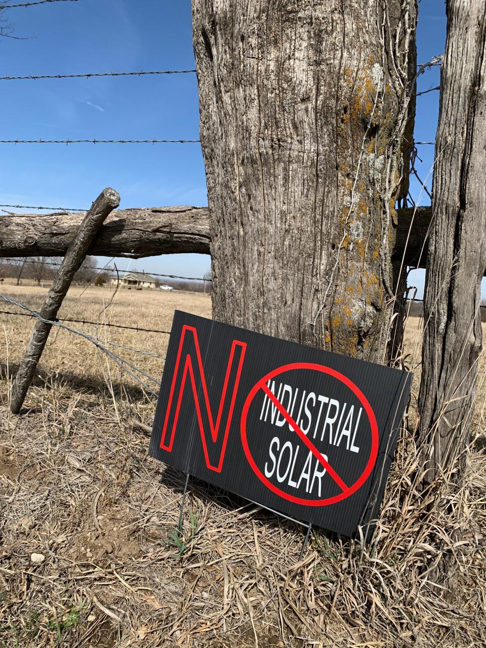 A sign opposing a solar power installation in rural Kansas.