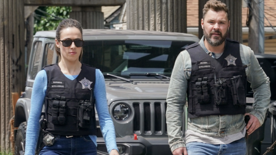 Marina Squerciati as Kim Burgess and Patrick John Flueger as Adam Ruzek in “Chicago P.D.” on NBC