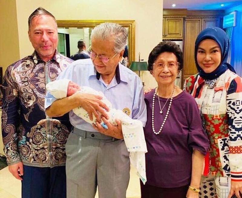 Datin Seri Umie Aida (right) was overjoyed as her newly adopted baby girl, Aisya, received a warm welcome from Prime Minister Tun Dr Mahathir Mohamad and his wife Tun Dr Siti Hasmah. — Instagram/@umieaida9