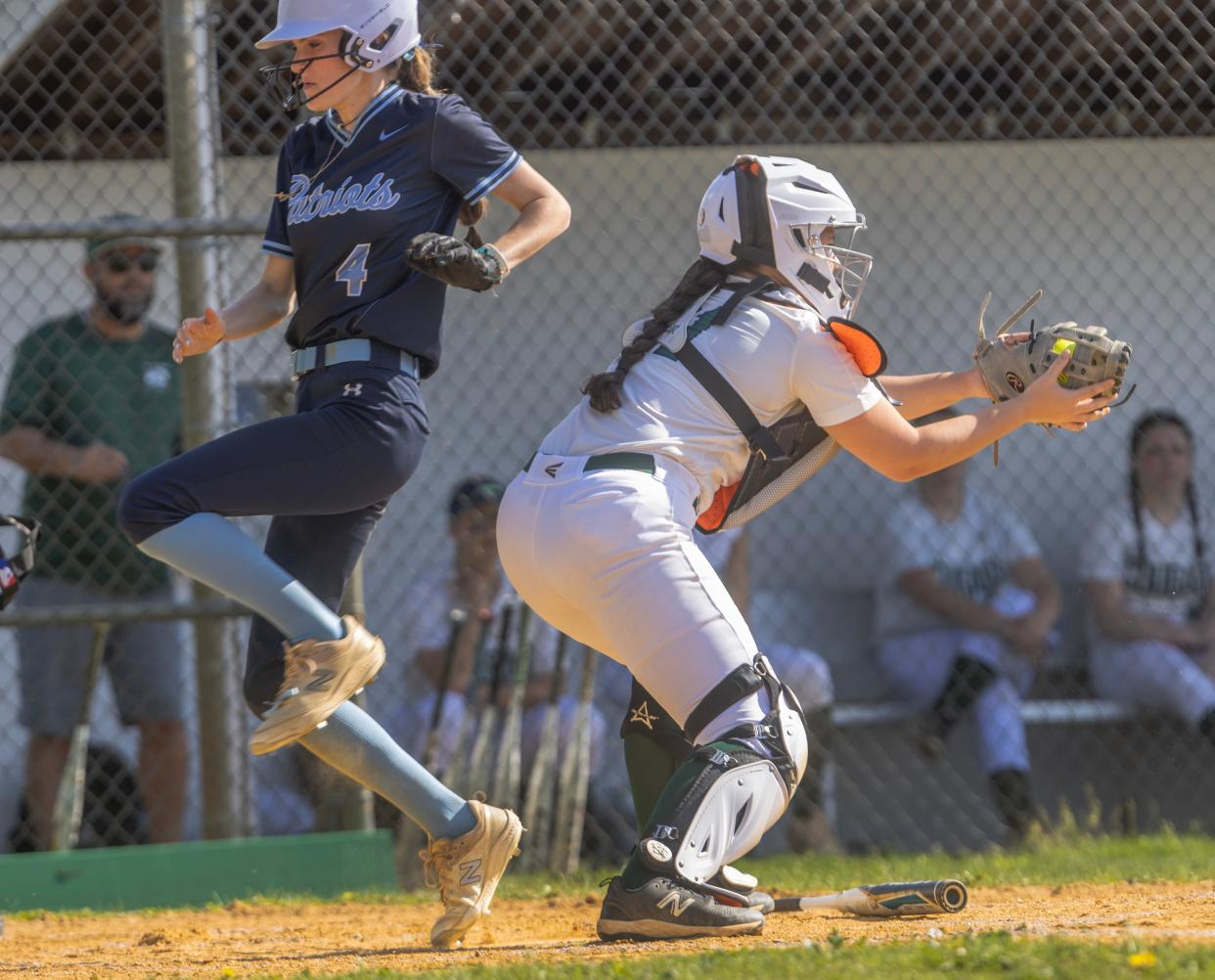 Freehold’s Sienna Smith crosses the plate in the first inning for the first run of the game. Freehold Township Softball defeats Colts Neck 3-2 in Colts Neck on April 15, 2024.