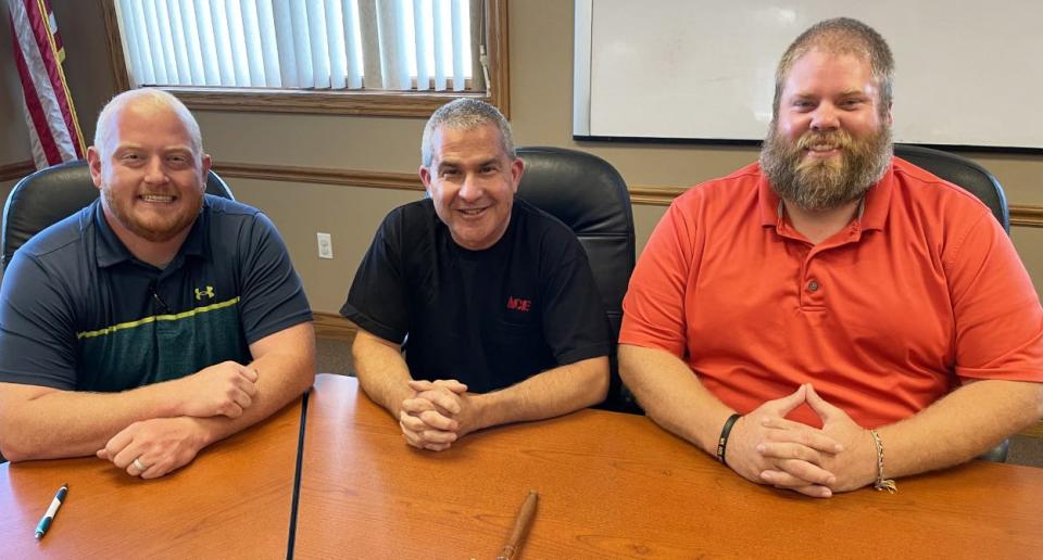 Three hold new seats on the Quincy Village Council due to a vacancy created by Nick Loomis moving away: Bryan Lah, newly appointed trustee, Mike Hagaman, village president and Andrew Craig, president pro-tem.
