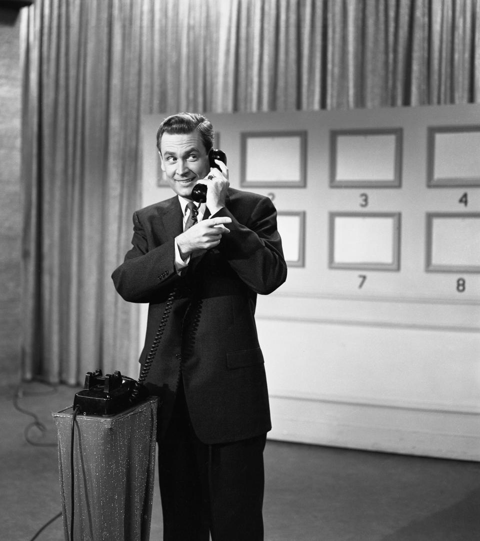 Bob Barker on the phone while hosting Truth or Consequences
