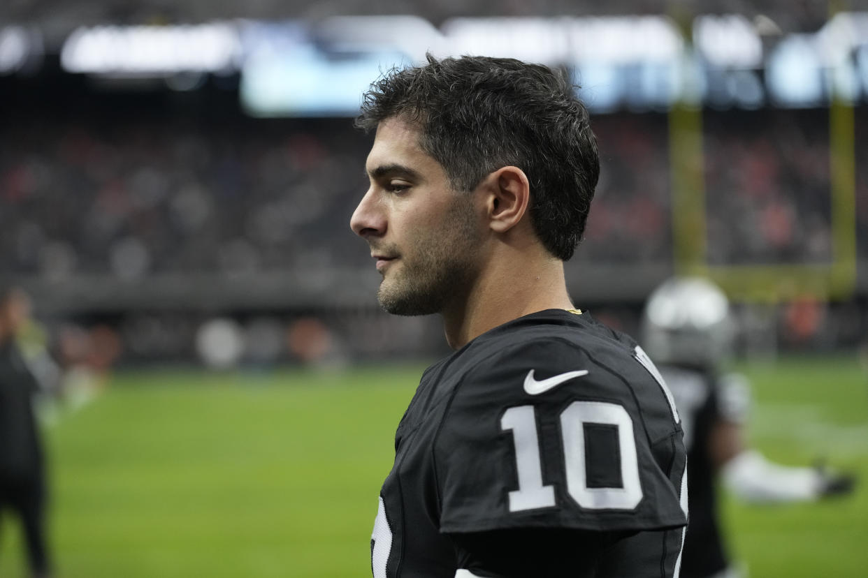 Las Vegas Raiders quarterback Jimmy Garoppolo (10) warms up before an NFL football game against the Denver Broncos, Sunday, Jan. 7, 2024, in Las Vegas. (AP Photo/John Locher)