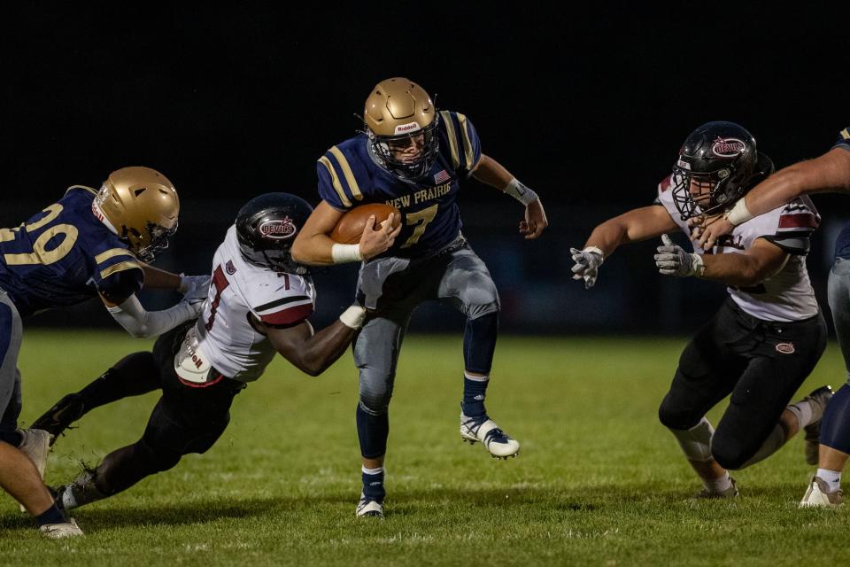 New Prairie's Marshall Kmiecik runs with the ball during the Lowell-New Prairie high school football game on Friday, September 03, 2021, at Amzie Miller Field in New Carlisle, Indiana. On Friday Kmiecik and the Cougars beat Lowell again, this time for a spot in next week's semistate.