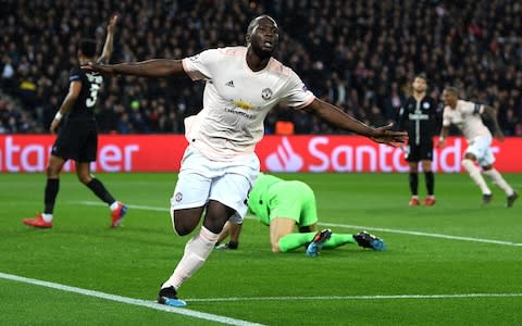  Romelu Lukaku of Manchester United celebrates after scoring his sides second goal during the UEFA Champions League Round of 16 Second Leg match between Paris Saint-Germain and Manchester United - Credit: GETTY IMAGES