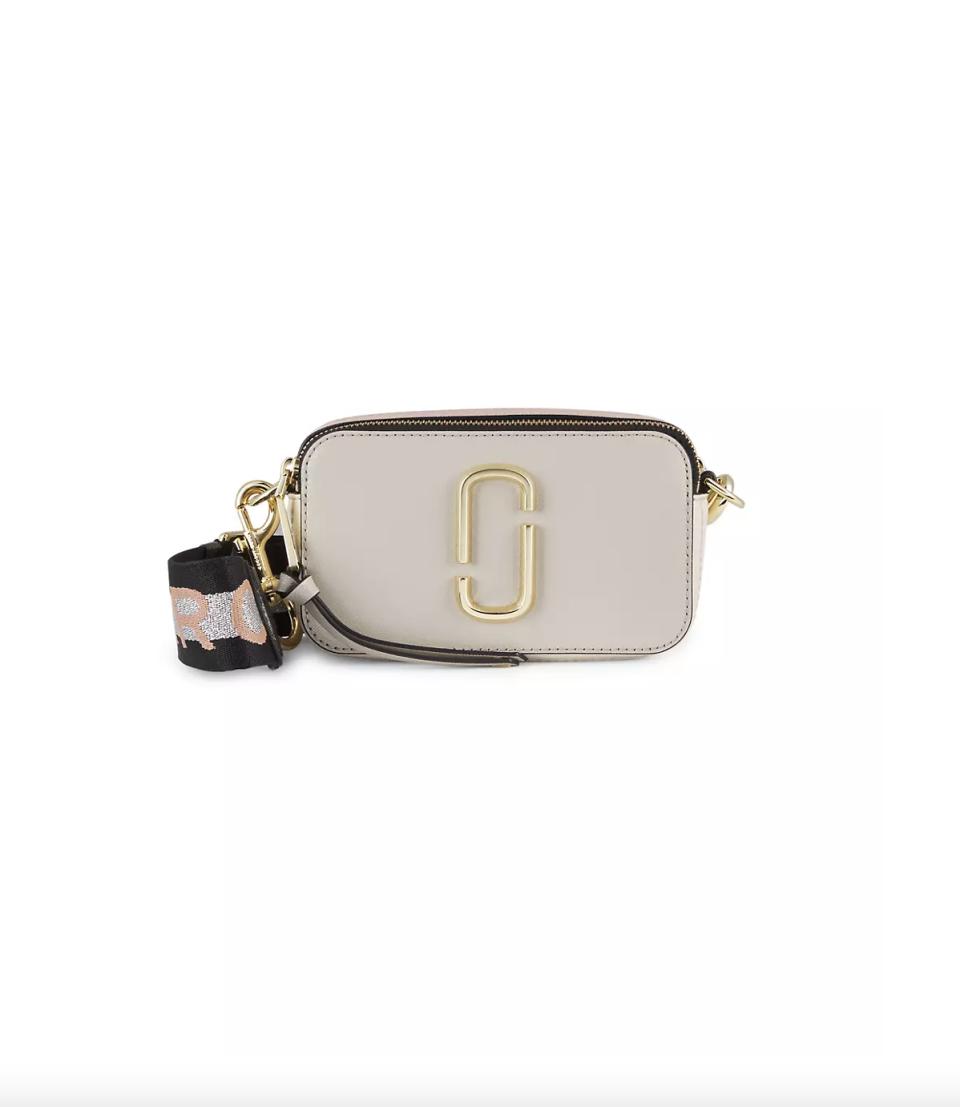 <p><a href="https://go.redirectingat.com?id=74968X1596630&url=https%3A%2F%2Fstockx.com%2Fthe-marc-jacobs-the-snapshot-camera-bag-beige-black-pink-metallic&sref=https%3A%2F%2F" rel="nofollow noopener" target="_blank" data-ylk="slk:Shop Now;elm:context_link;itc:0;sec:content-canvas" class="link ">Shop Now</a></p><p>The Snapshot Camera Bag</p><p>stockx.com</p><p>$325.00</p>