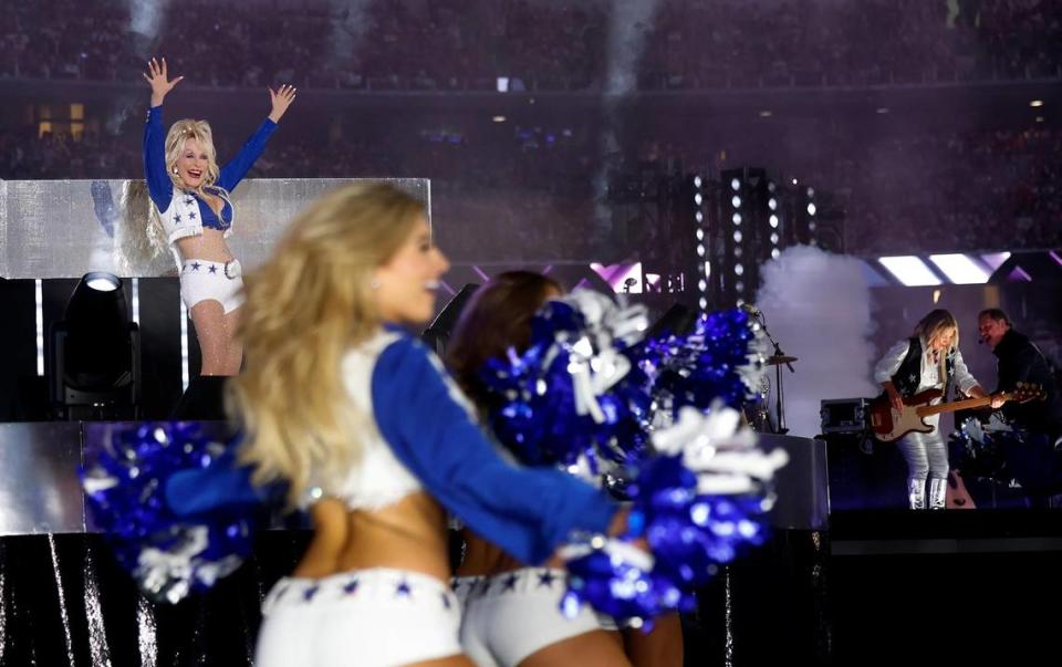 Dolly Parton performs during the Dallas Cowboys’ halftime show to kickoff the Red Kettle Campaign on Thursday, November 23, 2023, at AT&T Stadium in Arlington. Amanda McCoy/amccoy@star-telegram.com