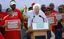 U.S. Sen. Bernie Sanders, I-Vt, tells thousands at a pro-union rally near Nissan Motor Co.'s Canton, Miss., plant, Saturday, March 4, 2017, that he congratulates workers for their courage "in standing up for justice." Among the participants were actor Danny Glover, national NAACP President Cornell Brooks, U.S. Rep. Bennie Thompson, D-Miss., and UAW president Dennis Williams. (AP Photo/Rogelio V. Solis)