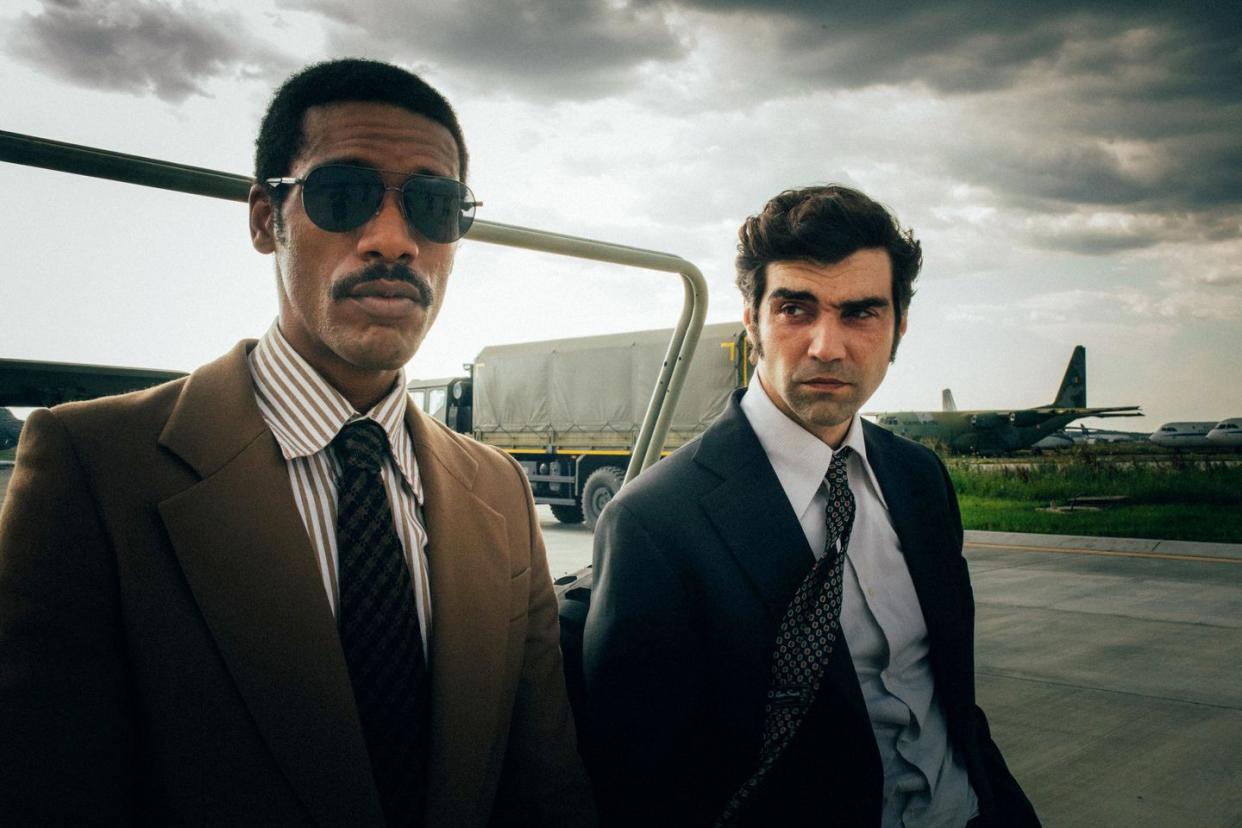 parker sawyers and alec secarean as frank jackson and victor godeanu, spymaster