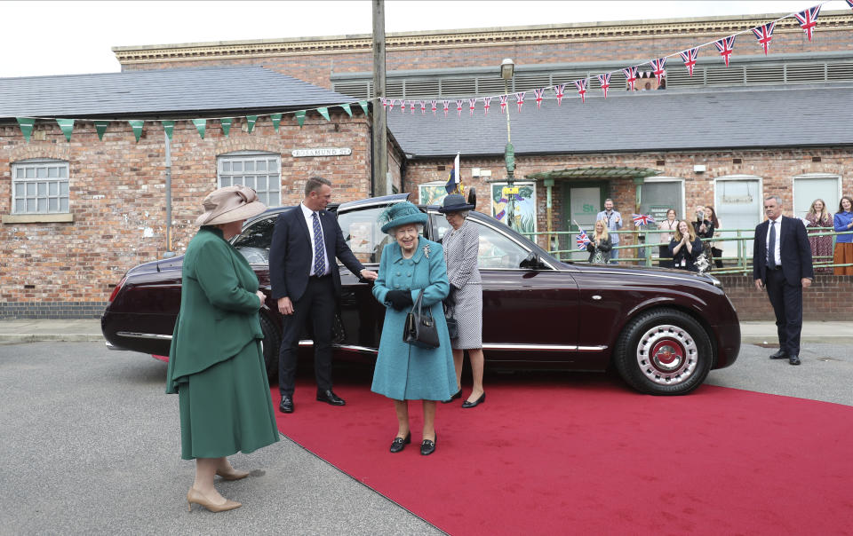 Britain's Queen Elizabeth II visits the set of the long running television series Coronation Street, in Manchester, England, Thursday July 8, 2021. (AP Photo/Scott Heppell)