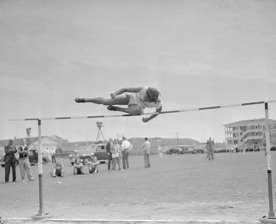 <h1 class="title">Alice Coachman up and over High Jump Bar</h1><cite class="credit">Bettmann / Getty Images</cite>