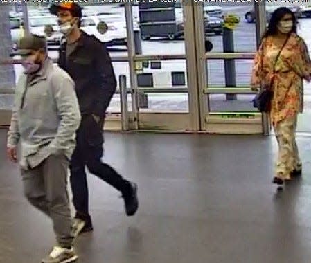The Ontario County Sheriff's Office is seeking help in identifying these three people who are believed to have installed card-skimming devices at the Canandaigua and Geneva Walmart stores. This photo was taken at the Canandaigua store.