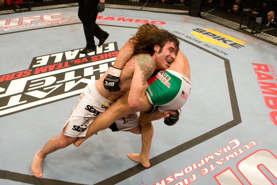 LAS VEGAS - DECEMBER 8:  Roger Huerta (red/white/green shorts) def. Clay Guida (long hair) - Submission (rear naked choke) - :31 round 3 during The Ultimate Fighter 6 Finale on December 8, 2007 in Las Vegas, Nevada. (Photo by: Josh Hedges/Zuffa LLC via Getty Images)