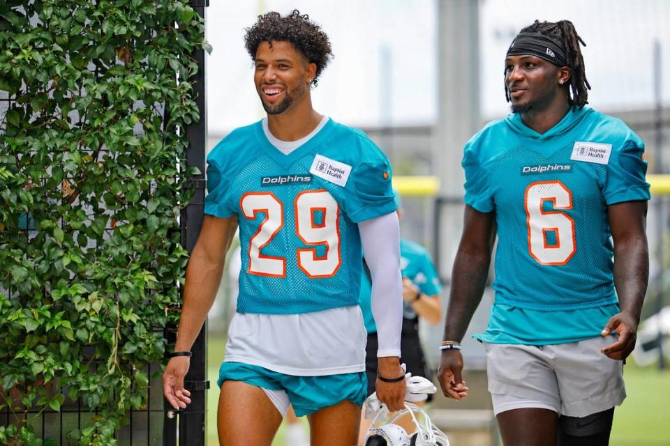 Miami Dolphins safety Brandon Jones (29) and Miami Dolphins cornerback Trill Williams (6) arrive for a press conference after practice at the Baptist Health Training Complex in Miami Gardens, Florida on Wednesday, July 26, 2023.