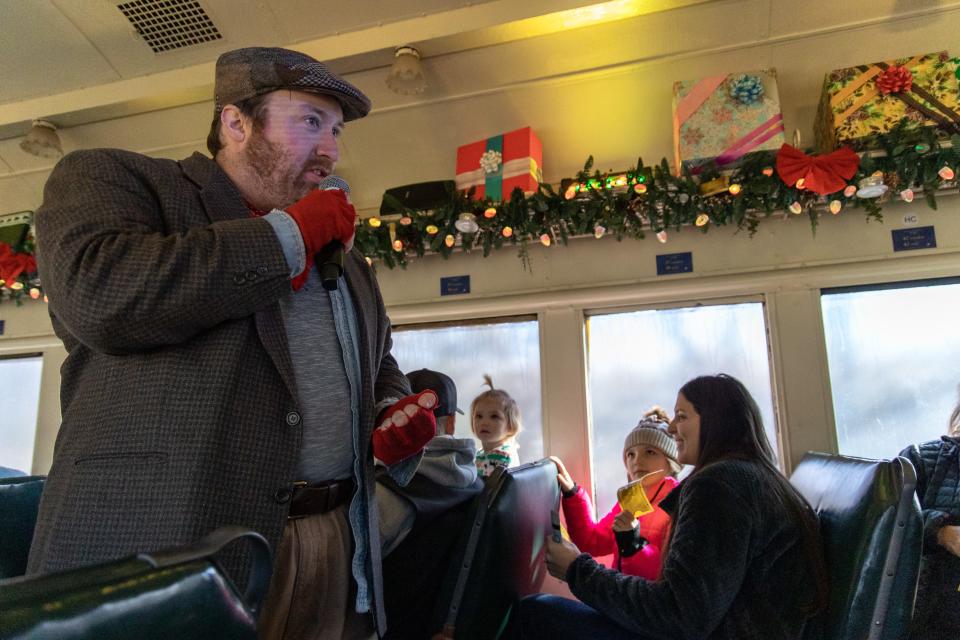 The Hobo character, who dubbs himself the "King of The Polar Express," visits with passengers on "The Polar Express Train Ride" in 2022 at the Oklahoma Railway Museum.