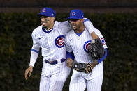 Chicago Cubs' Christopher Morel, left, and Nelson Velazquez celebrteat the team's 4-2 win over the Philadelphia Phillies after a baseball game Wednesday, Sept. 28, 2022, in Chicago. (AP Photo/Charles Rex Arbogast)