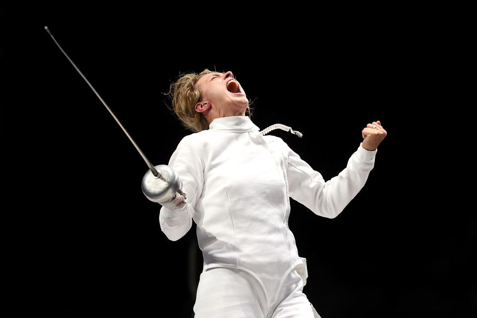 LONDON, ENGLAND - JULY 30: Britta Heidemann of Germany celebrates defeating A Lam Shin of Korea during the Women's Epee Individual Fencing Semifinals on Day 3 of the London 2012 Olympic Games at ExCeL on July 30, 2012 in London, England. Heidemann scored the final point with one second left on the clock to win against Shin. (Photo by Ezra Shaw/Getty Images)
