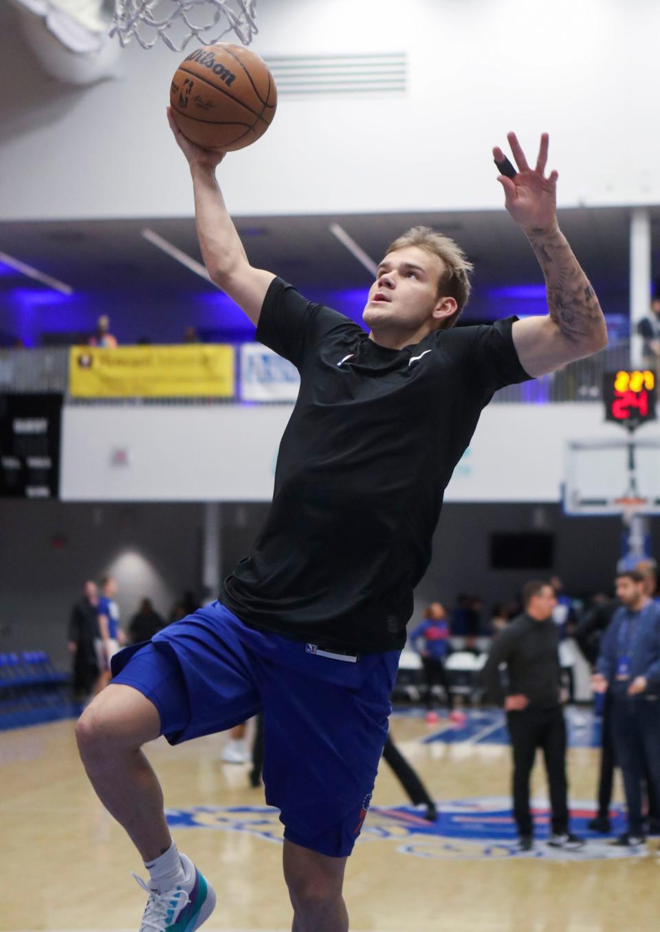 NBA slam dunk contest winner Mac McClung puts up a casual slam in warmups as he returns to the Blue Coats in a G-League game at the Chase Fieldhouse on Wednesday, Feb. 22, 2023.