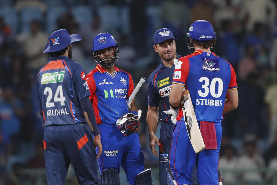 Players of Lucknow Super Giants greet Delhi Capitals' Tristan Stubbs, right, and Shai Hope, second left, at the end of the Indian Premier League cricket match between Lucknow Super Giants and Delhi Capitals in Lucknow, India, Friday, April 12, 2024. (AP Photo/Surjeet Yadav)