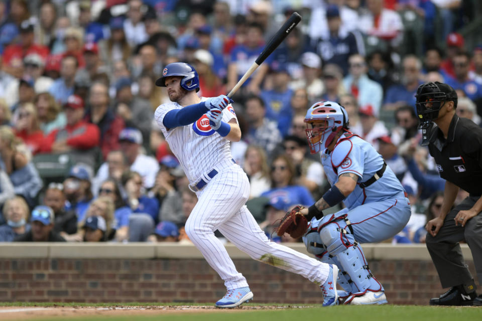 Chicago Cubs' Ian Happ watches his RBI single during the third inning of a baseball game against the St. Louis Cardinals Saturday, Sept. 25, 2021, in Chicago. (AP Photo/Paul Beaty)