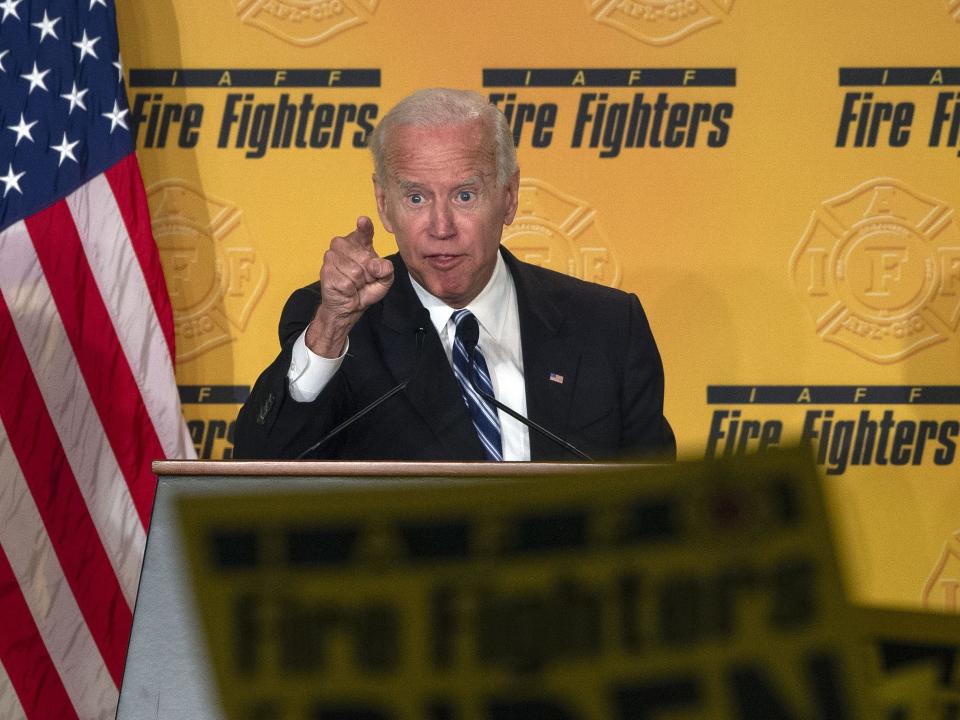 Former US Vice President Joe Biden speaks at the International Association of Fire Fighters conference in Washington, DC on March 12, 2019 as his wife Jill Biden looks on. (Photo by ANDREW CABALLERO-REYNOLDS / AFP) (Photo credit should read ANDREW CABALLERO-REYNOLDS/AFP/Getty Images)