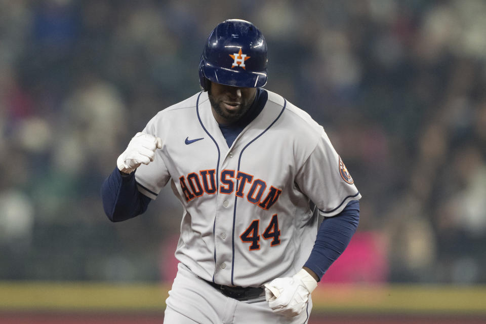 Houston Astros' Yordan Alvarez pumps his fist while rounding the bases after hitting a solo home run off Seattle Mariners starting pitcher Luis Castillo during the third inning of a baseball game, Monday, Sept. 25, 2023, in Seattle. (AP Photo/Stephen Brashear)