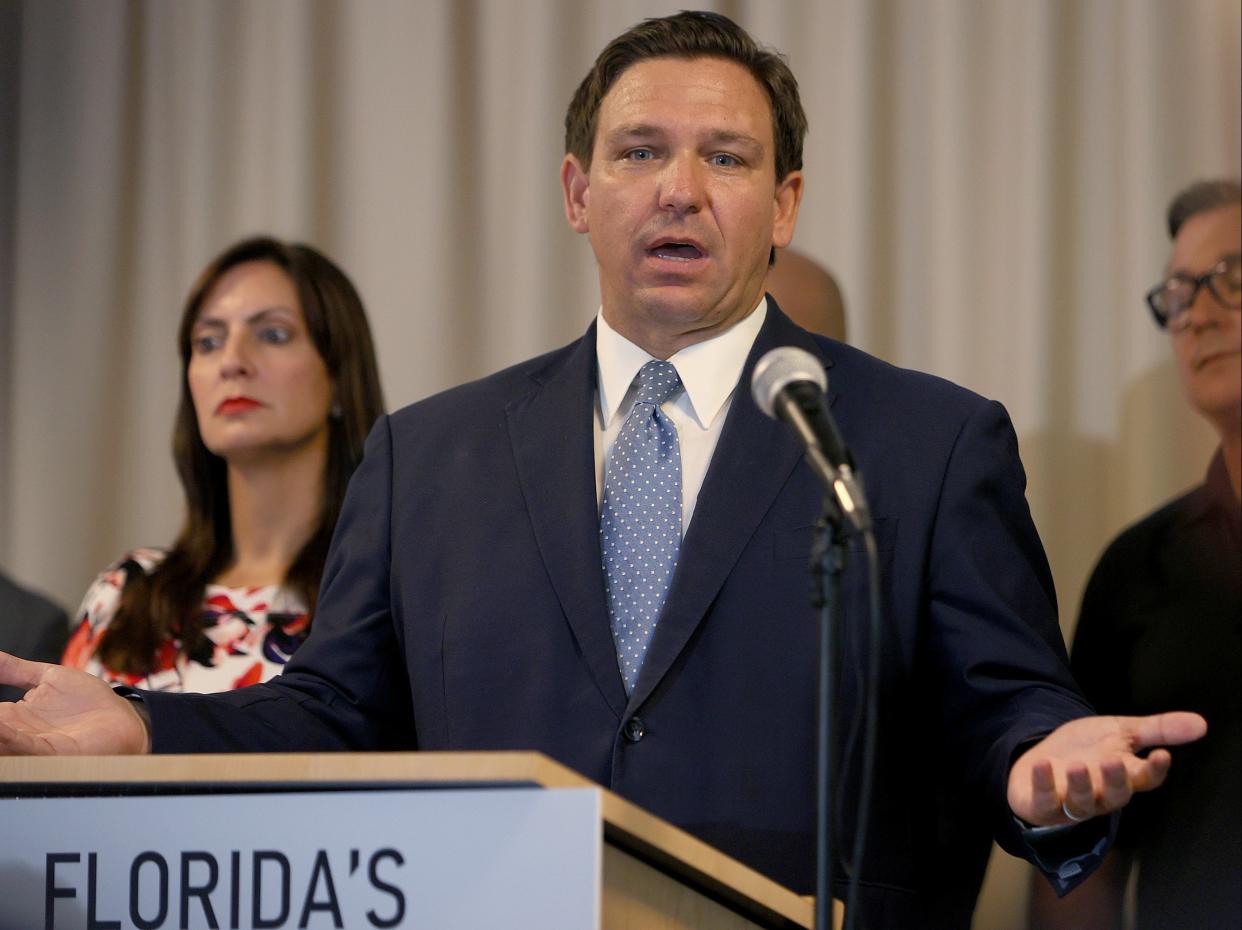 Florida Gov Ron DeSantis speaks during an event to give out bonuses to first responders held at the Grand Beach Hotel Surfside on 10 August 2021 in Surfside, Florida (Getty Images)