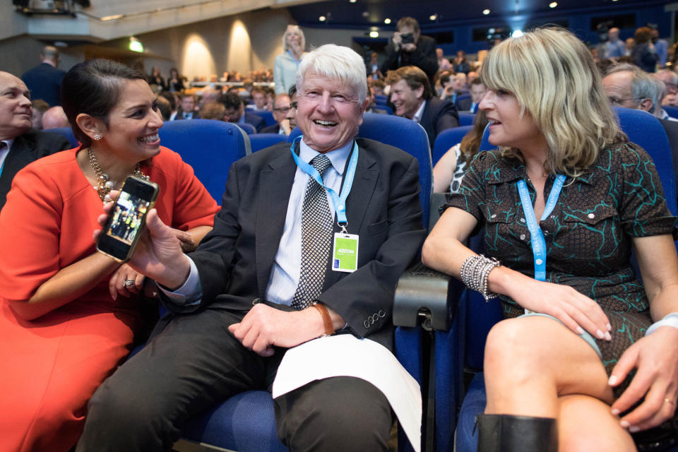 Priti Patel (left) with Boris Johnson's father Stanley Johnson and sister Rachel Johnson watch him speaking at a fringe event at the Conservative Party annual conference at the International Convention Centre, Birmingham. (Photo by Stefan Rousseau/PA Images via Getty Images)