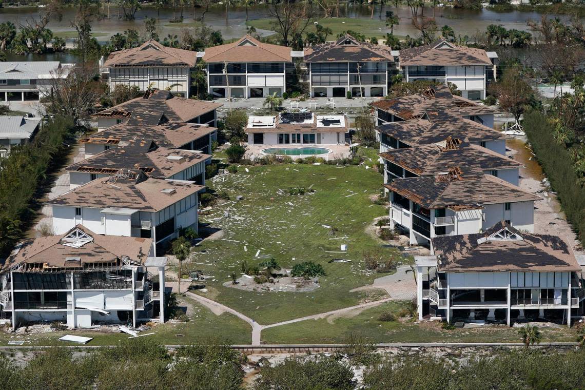 Damaged homes are seen in the wake of Hurricane Ian, Thursday, Sept. 29, 2022, on Sanibel Island, Fla. (AP Photo/Wilfredo Lee)