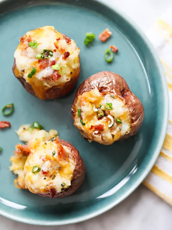 <p>Foodie Crush</p><p>These mini twice-baked red potatoes are super creamy and loaded with all the fixins’, for a crowd-pleasing appetizer or side to any meal.</p><p><strong>Get the recipe: <a href="https://www.foodiecrush.com/loaded-twice-baked-red-potatoes/" rel="nofollow noopener" target="_blank" data-ylk="slk:Loaded Twice-Baked Red Potatoes;elm:context_link;itc:0;sec:content-canvas" class="link ">Loaded Twice-Baked Red Potatoes</a></strong></p>