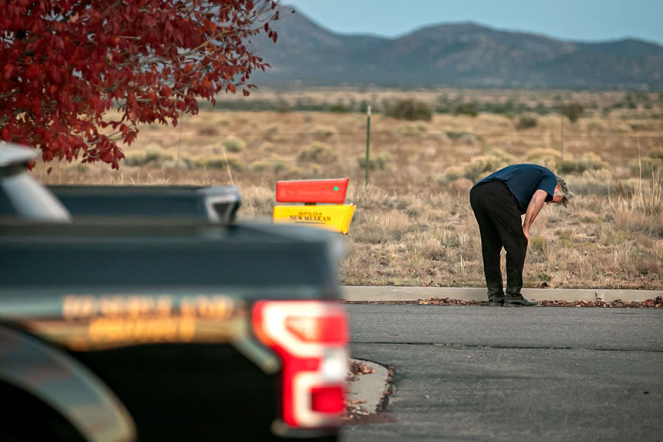 Alec Baldwin leans over in the parking lot outside the Santa Fe County Sheriff's offices after being questioned on the shooting. (Jim Weber / The New Mexican)