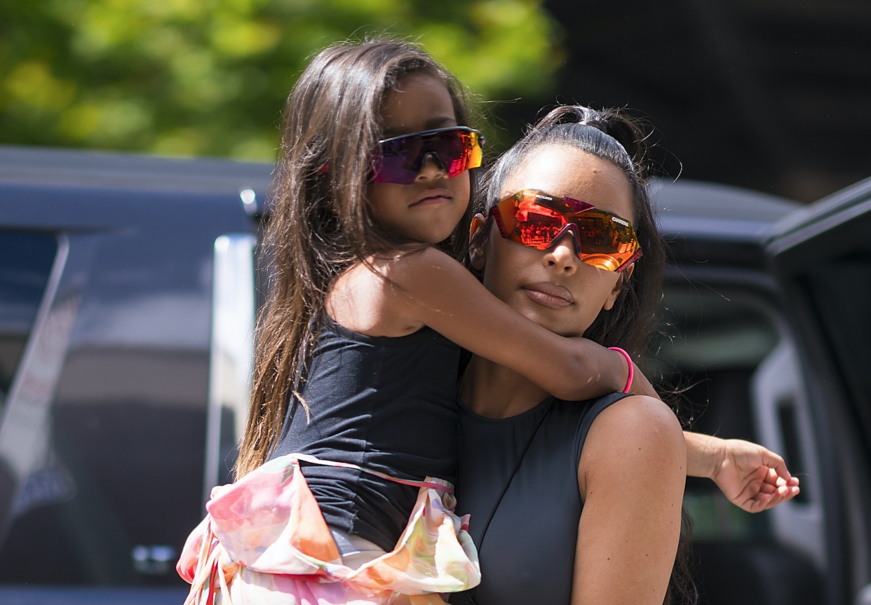 Kim Kardashian has caused controversy by straightening her young daughter’s hair. [Photo: Getty]