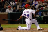 ARLINGTON, TX - OCTOBER 24: Adrian Beltre #29 of the Texas Rangers hits a solo home run in the sixth inning during Game Five of the MLB World Series against the St. Louis Cardinals at Rangers Ballpark in Arlington on October 24, 2011 in Arlington, Texas. (Photo by Rob Carr/Getty Images)