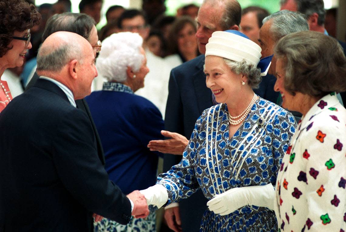 Queen Elizabeth greets people at the Morton H. Meyerson Symphony Center in Dallas.