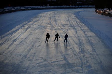 People skate on the Rideau Canal, with the temperature at about minus 24 degrees Celsius, in Ottawa, Ontario, Canada January 5, 2018. REUTERS/Chris Wattie
