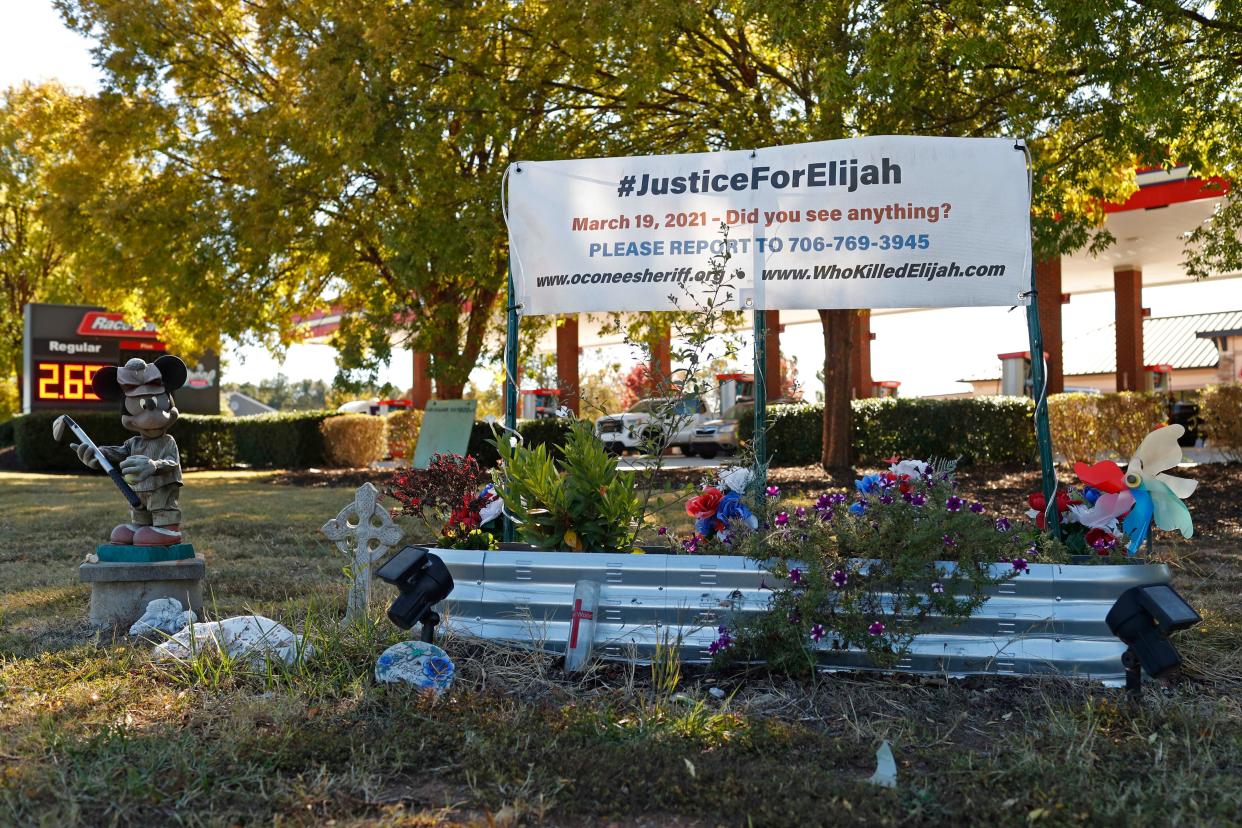 FILE - A Memorial for Elijah Wood, a 23-year-old resident of Watkinsville, who was killed behind the checkout counter at the RaceTrac station where he worked on U.S. Highway 441, on Friday, March 19, 2021. Former University of Georgia football player Ahkil Nasir Crumpton on Wednesday, Oct. 25, 2023 was found guilty in federal court of the robbery that preceded Wood's shooting.