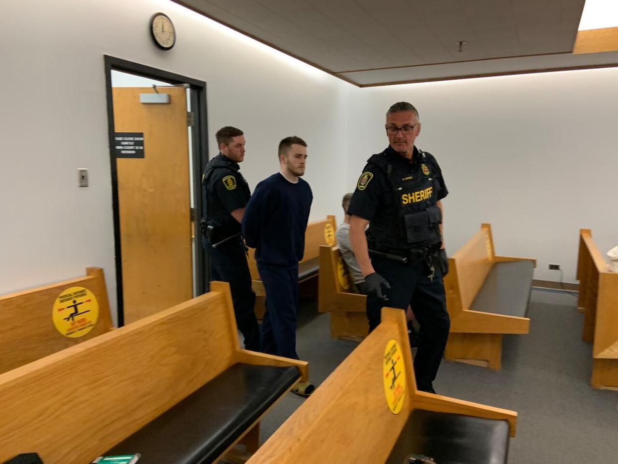 Brandon Chafe, 20, appeared in provincial court on Monday. He's facing 10 charges, including aggravated assault. (Darrell Roberts/CBC - image credit)