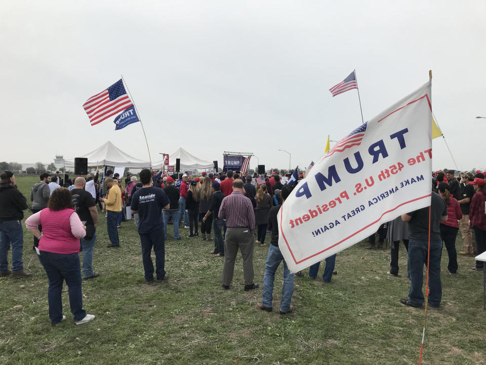 A pro-Trump rally in Otay Mesa near the wall prototypes the president visited Tuesday. (Photo: Matt Ferner/HuffPost)