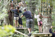 <p>Matt and Elsa pictured tackling the obstacle course. Source: Getty </p>