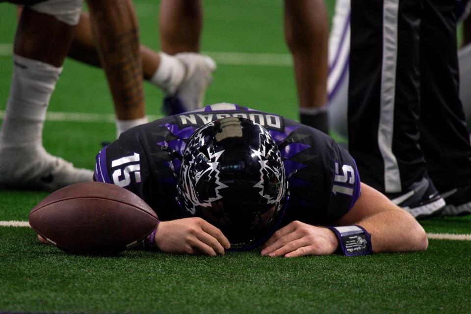 This was TCU quarterback Max Duggan's Heisman moment, lying on the turf, exhausted, at the end of a long drive near the end of the Big 12 championship game. Even in an overtime loss, the CFP-bound quarterback was the star of the game.