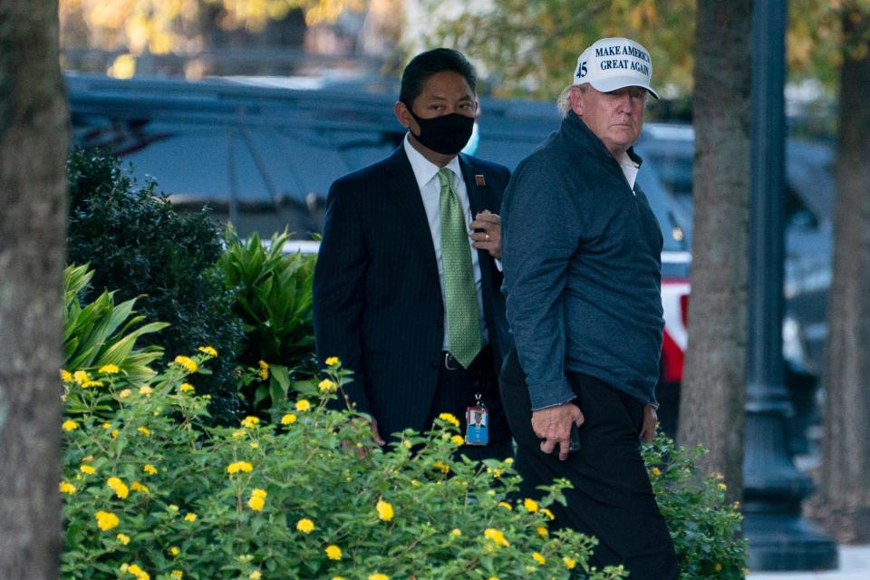 President Donald Trump returns to the White House after playing a round of golf on Saturday.