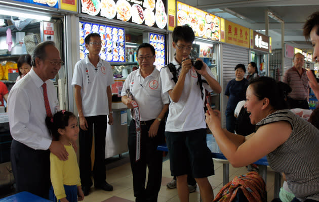 Dr Tan Cheng Bock describes his reception at Kovan, a Workers' Party ward, as "warm". (Yahoo! photo/Alicia Wong)