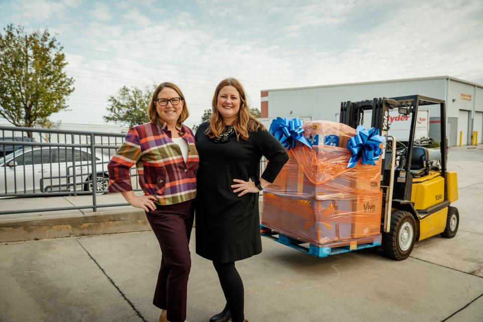 Blair Cromwell, Director, Global Responsibility Communications at Walmart (right) and Catherine Steck McManus, President & CEO, Habitat for Humanity Greater Orlando & Osceola County (left)