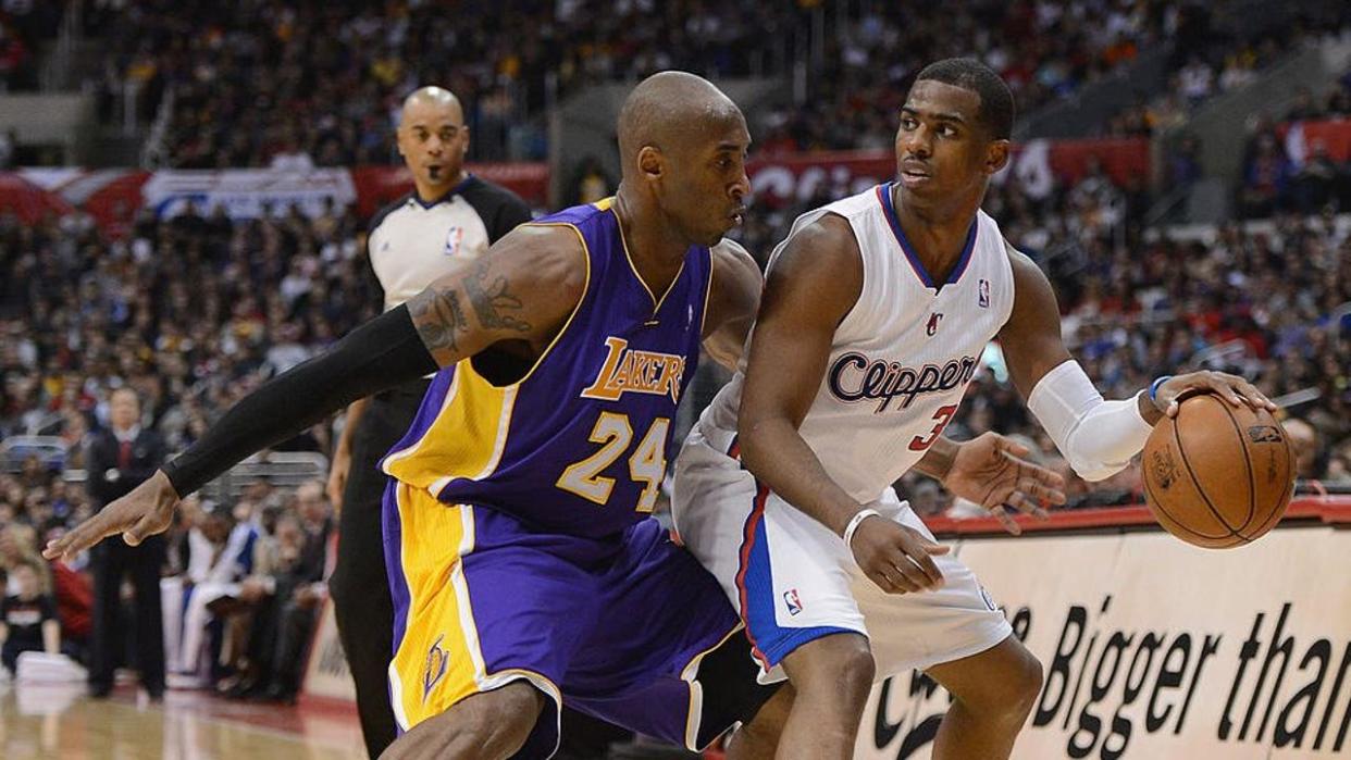 <div>Chris Paul #3 of the Los Angeles Clippers keeps his dribble away from Kobe Bryant #24 of the Los Angeles Lakers during a 107-102 Clipper win at Staples Center on January 4, 2013. (Photo by Harry How/Getty Images)</div> <strong>(Getty Images)</strong>