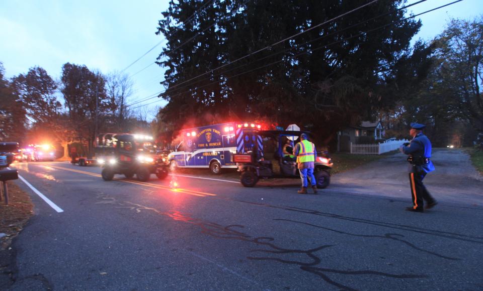 First responders use UTVs to head down Walnut Street in Hampton Township near where an airplane crashed, killing two, on Thursday, Nov. 11, 2021.