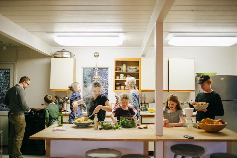 The Blair brood makes a meal. Mom Gabrielle Blair (center, in front of cupboard) is a longtime designer and blogger who turned her attention to the issue of unwanted pregnancies in a Twitter thread in 2018. It has since garnered nearly 40 million impressions.
